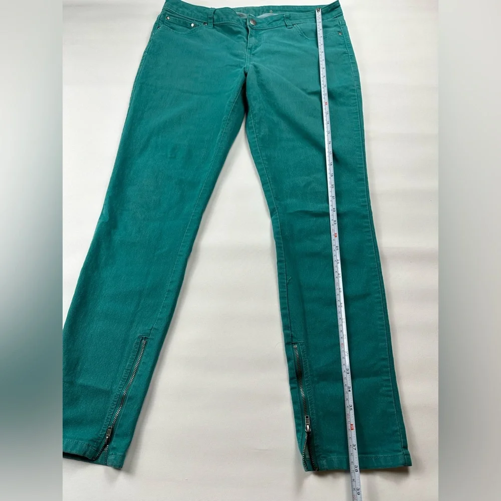 JLo straight jeans. Stretchy. Teal with zipper at ankle. Size 12